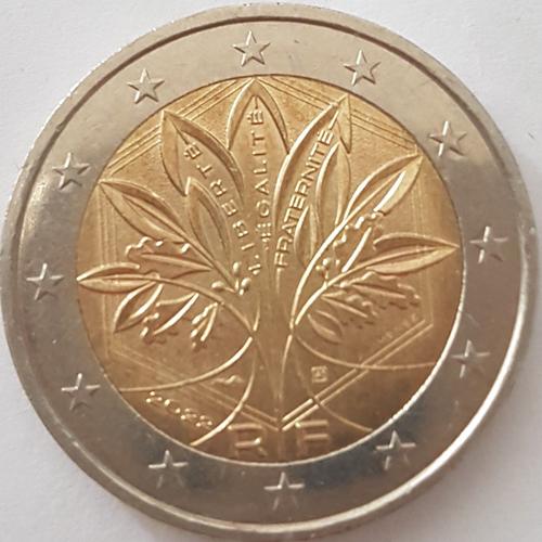 Pièce de monnaie de 2 fautée à l effigie d un arbre de vie marqué