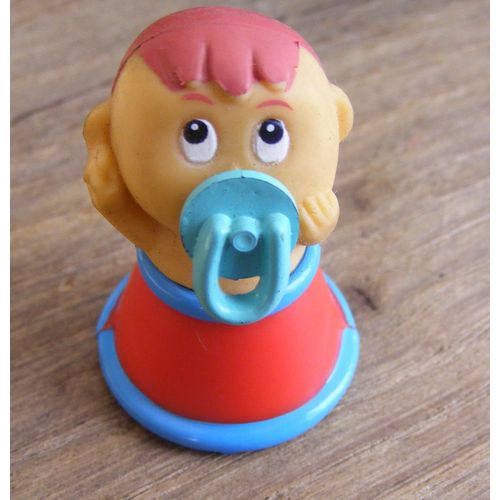 Kinder - K02 N. 115 / K02n115 - Le Personnage Sur Petites Roues : Le Bébé Avec Sa Tétine