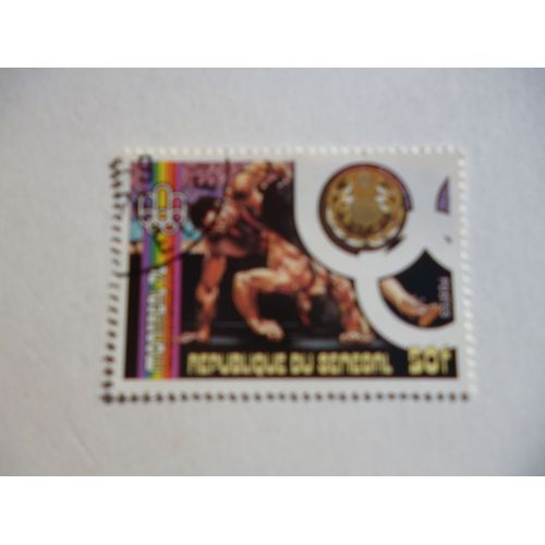 Timbre "Sénégal :Jeux Olympiques Montreal 1976: Lutte".