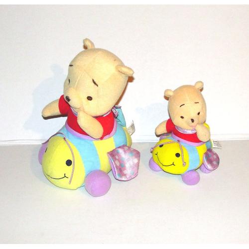 Winnie L'ourson Sur Avion Qui Avance En Sautillant Peluche Aurora Mattel Fisher Price