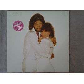 33 Tours .  Guilty ( Duo Avec Barry Gibb )  /  Woman In Love  /  Run  Wild /  Promises  /  The Love Inside  /  What Kind Of Fool  /  Life  Story  /  Never Give Up  /  Make It Like A Memory