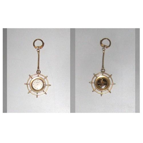 MONTRE ESPERANTO EN PORTE CLE EN GOUVERNAIL BATEAU MARINE AIGUILLE MECANISME AUTOMATIC A REMONTER  METALLIQUE DORE COULEUR OR  DORE SANS  BESOIN DE PILE PUBLIC MIXTE HOMME ET FEMME BIJOU UTILE