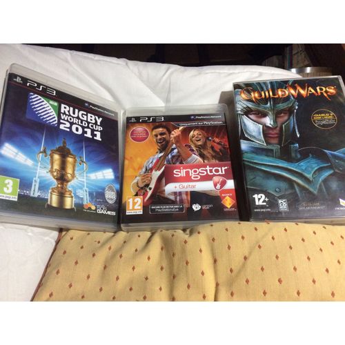 Lot De 3 Jeux Vidéo  2 Jeux Ps3 Rugby World Cup 2012 / Jeu Singstar Et Un Jeu Pc Complet Guild Wars  