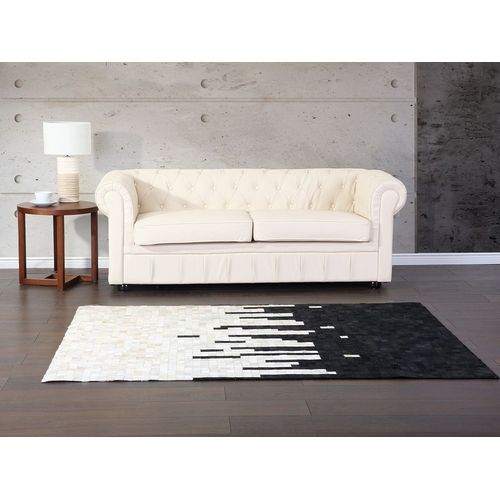 Tapis Noir Et Crème En Peau De Vache 160 X 230 Cm Bolu