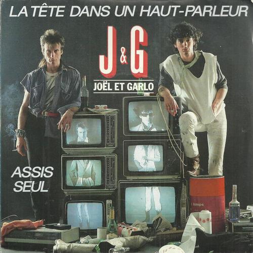 La Tete Dans Un Haut-Parleur (Joel Couttausse / Claude Calmon) 3'30  /  Assis Seul (Joel Couttausse / Claude Calmon) 3'20 