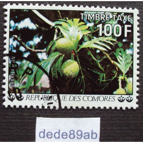 République Des Comores..  100 F Timbre Taxe . Arbre À Pain . Oblitéré Used Stamp.