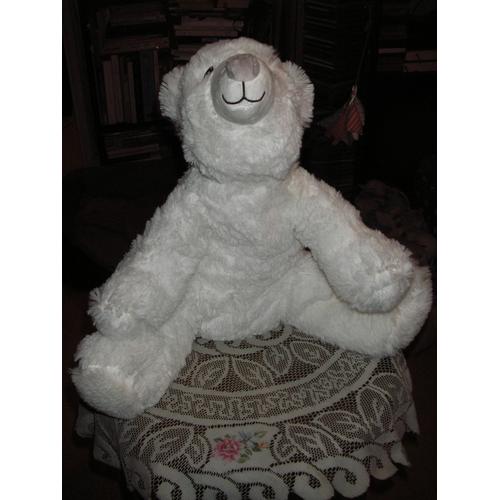 Peluche Toute Douce Ours Polaire " Neige " ,Coloris Blanc ,Yeux Et Museau Brodés Marron Et Noir ,Bout De Museau Gris ,Hauteur 45 Cm ,Largeur 45 Cm ,Profondeur 35 Cm ,100% Polyester .