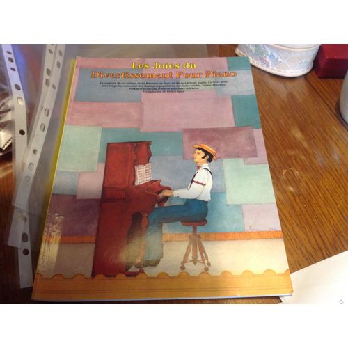 Les Joies Du Divertissement Pour Piano  Du Baroque Au Jazz De Mozart À Scott Hop L'on Un Livre Pour Tous Les Goûts Contenant Des Classiques Populaires Des Solos Inédits Valses. Marches. Polkas. Etc...