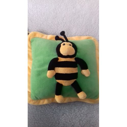 Peluche Doudou Abeille Noir Et Jaune Sur Coussin Rouge Gipsy