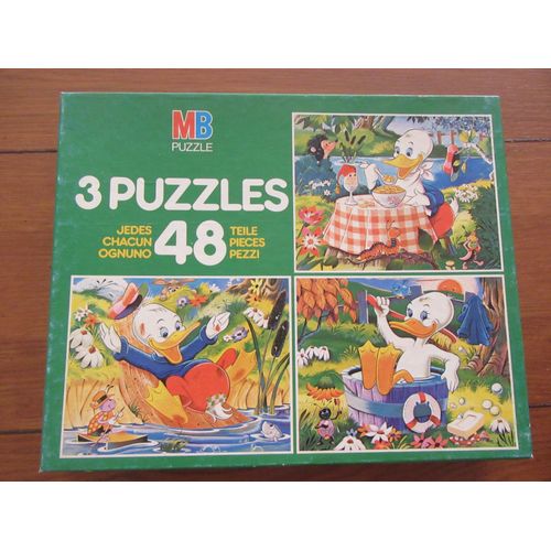 Puzzle De 48 Pièces Ayant Pour Thème L"Donald Le Canard" Et Permettant De Faire 3 Montages Différents. Taille Des Pièces : 23x19. Boite Complète Et En Bon État. Années 1980. Mb Puzzle.