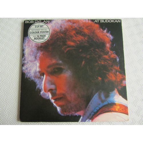 At Budokan (Live) : Mr. Tambourine Man - Shelter From The Storm - Maggie's Farm - Like A Rolling Stone - Oh Sister - Knockin' On Heaven's Door - Etc...