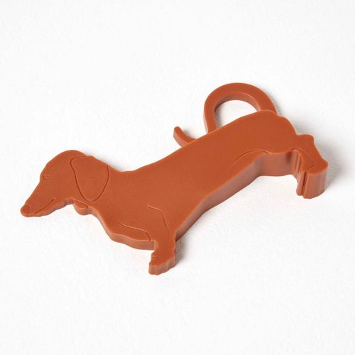 Cale-porte en plastique en forme de chien marron