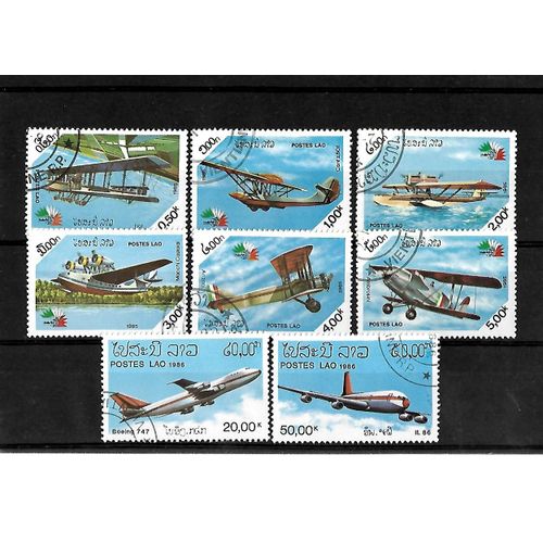 Laos-1985/1986-Italia 85 Et Avions Et Transports-Lot De 8 Timbres Oblitérés-Très Bon Etat