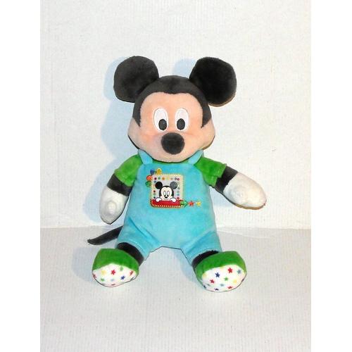 Mickey Assis Salopette Bleu Avec Ecusson Mickey Chausson Vert Etoile Multicolore Doudou Peluche Disney Nicotoy 24cm