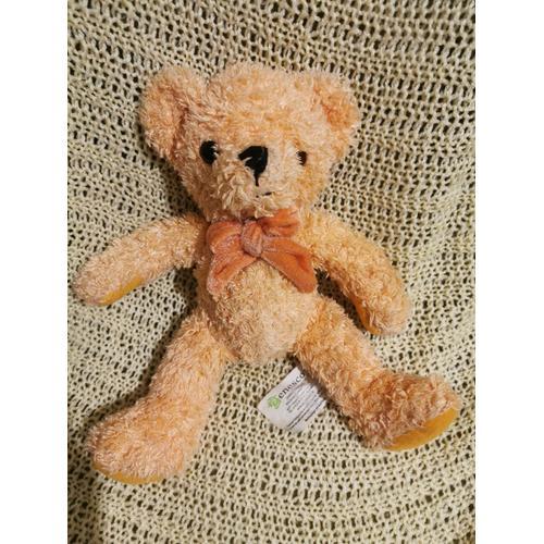 Doudou Peluche Ours Bouclettes Noeud Orange Pêche Billes Enesco