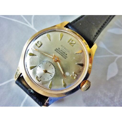 Montre Africa Prima Mécanique Des Années 1960 - Cadran Argenté, Boîtier Plaqué Or, Quasi Neuve