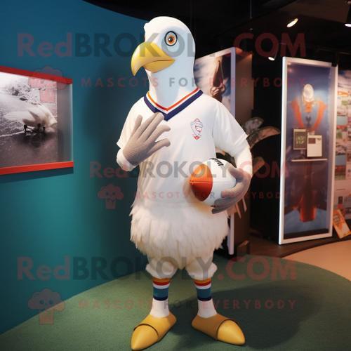 Personnage De Costume De Mascotte Redbrokoly De Pigeon Crème Habillé D'un Maillot De Rugby Et D'anneaux