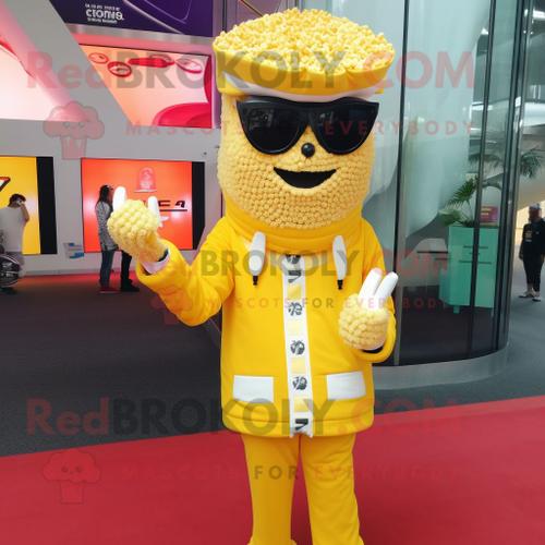 Personnage De Costume De Mascotte Redbrokoly De Pop Corn Jaune Habillé D'un Coupe-Vent Et De Boucles D'oreilles