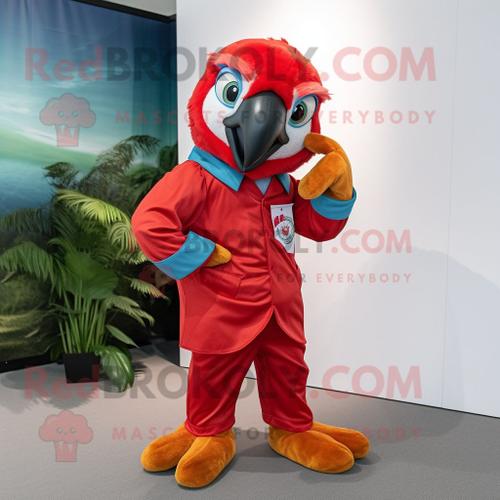 Mascotte Redbrokoly De Personnage D'ara Rouge Habillé D'un Combishort Et De Pochettes De Costume