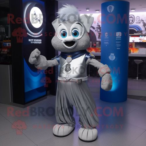 Mascotte Redbrokoly De Personnage Guinness Argenté Habillé D'un Jean Flare Et De Montres Digitales