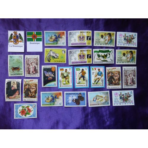 Timbres La Dominique - 23 Très Beaux Timbres Des Années 70 Avec La Coupe Du Monde De Football 1974, La Religion, Les Poissons...