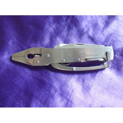 Couteau Suisse Assédic - Tout En Métal Argenté Avec Le Logo De L'assédic Du Sud Est Francilien Gravé Dessus. 14.6 Cm De Long Fermé.