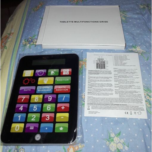 Tablette calculatrice multifonctions grise avec sa notice