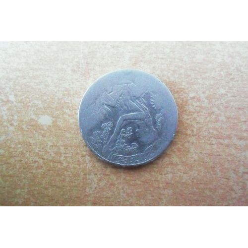 1 Dinar Tunisien De 1990 Désaxé.