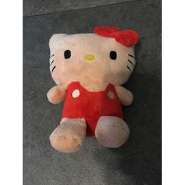 Doudou Hello Kitty blanche salopette rouge petit sac rose Sanrio