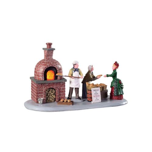 Village de noël le boulanger au fourneau