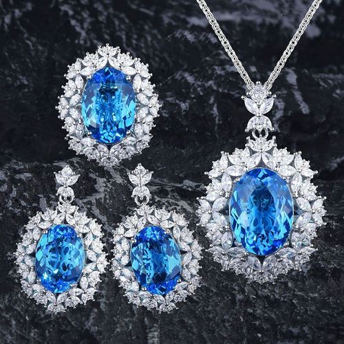 Luxe Heavy Industry Sea Blue Treasure Pigeon Oeuf Gemme Collier Pendentif Color Treasure Boucles D'oreilles Set Tempérament Zircon Bleu Collier