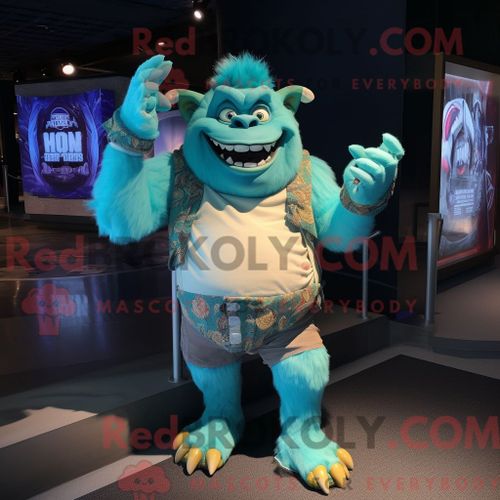 Personnage De Costume De Mascotte Redbrokoly Cyan Ogre Habillé Avec Un T-Shirt Graphique Et Des Ceintures De Smoking
