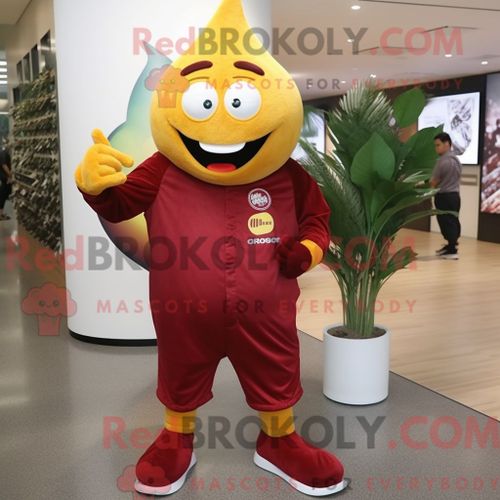 Costume De Mascotte Redbrokoly De Mango Maroon Habillé D Une Combinaison Et De Pinces À Chaussures