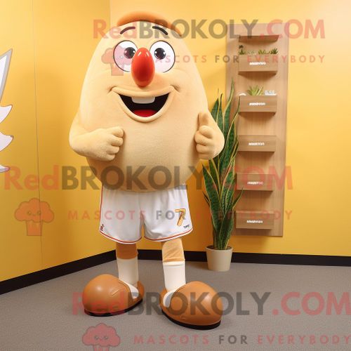 Costume Mascotte Redbrokoly De Mango Beige Personnage Habillé Avec Une Chemise De Rugby Et Des Lacets De Chaussures