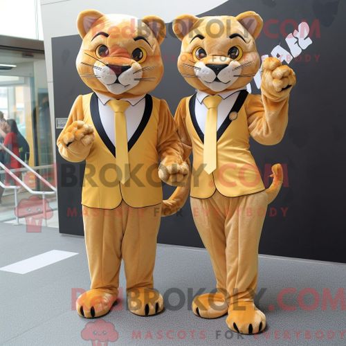 Costume Mascotte Redbrokoly Puma Doré Personnage Habillé Avec Une Mini-Robe Et Des Cravates