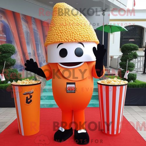 Mascotte Redbrokoly De Personnage Pop Corn Orange Habillé Avec Un Legging Et Des Bracelets