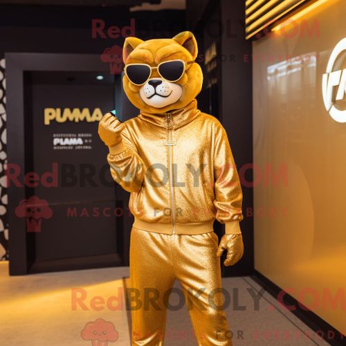 Costume Mascotte Redbrokoly De Puma Doré Personnage Habillé Avec Une Combinaison Et Des Lunettes De Soleil