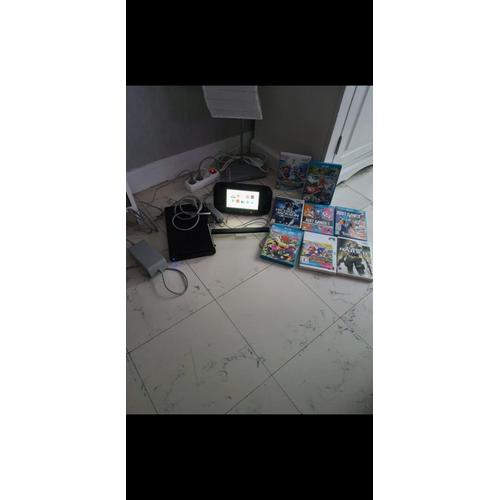 Vend Console Wii U Complète Avec Le Chargeur Pour La Console, Le Chargeur Pour La Tablette,Le Câble Hdmi,Le Support Pour La Tablette,Le Capteur De Mouvement Et 8 Jeux