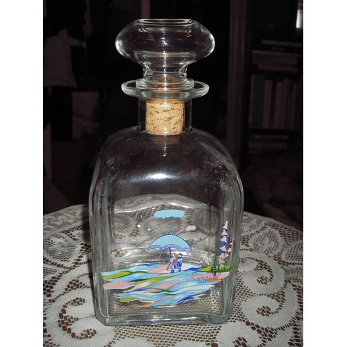 Carafe En Verre Épais Et Son Bouchon En Verre Et Liège De Marque Italy ,Décor Couple Sous Un Parapluie Dans La Plaine ,Contenance 500 Ml ,Dimensions :Hauteur Avec Bouchon 20 Cm ,Largeur 9,5 Cm .