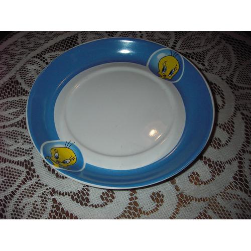 Assiette À Dessert " Titi " De Marque Star Line Tm & Warner Bros ,De Couleur Fond Blanc ,Bord Bleu ,Fantaisie Tête De Titi Dans Sa Bulle Sur Le Haut Et Sur Le Bas Du Bord ,Dimensions :Diamètre 16 Cm .