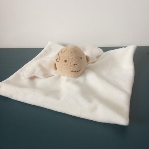 Doudou Plat Crème Petit Ange Dmc