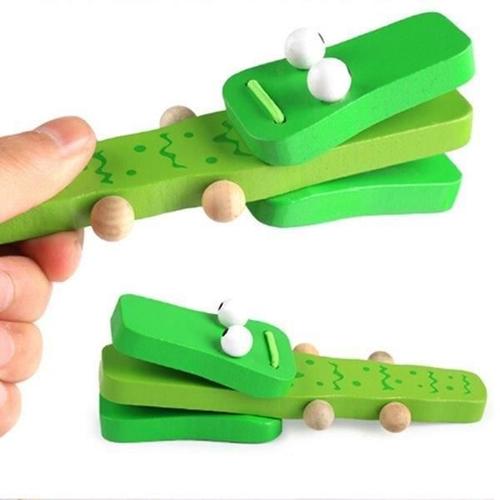 Castagnette en forme de crocodile en bois jeu Montessori * Matière : bois * Dimensions : 13 x 3 x 3 cm * Coloris : vert