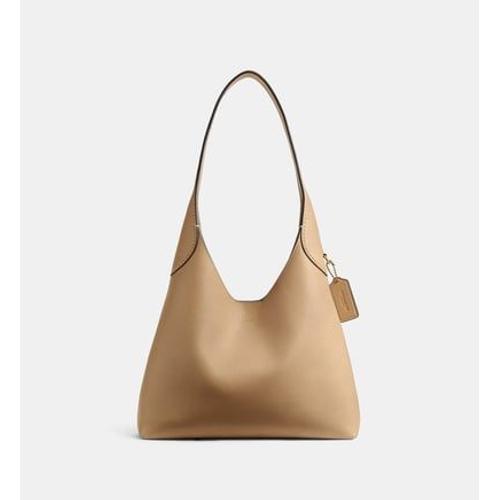 Coach - Sac à main hobo Courage 28 en cuir - Beige