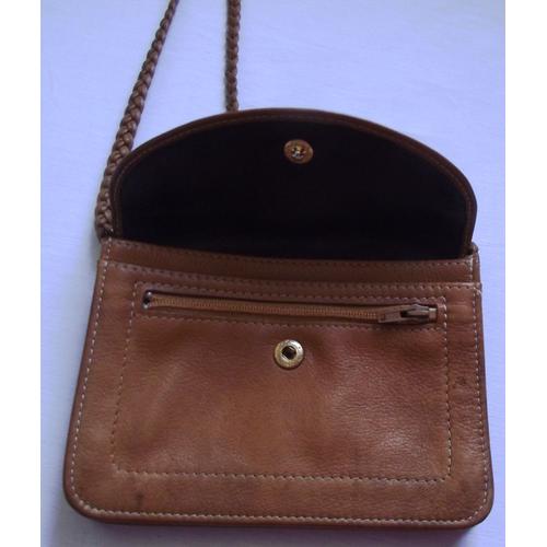 Pochette vintage cuir Marque Longchamp Paris Made in Mauritius .  3 compartiments dont un avec fermeture éclair et fermeture pression pour le tout :