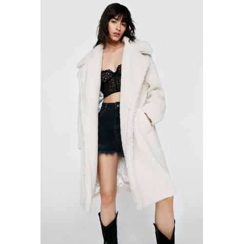 manteau blanc duveteux