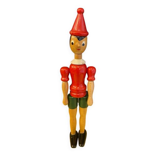 Statuette de pinocchio en bois articule jouet ancien rouge