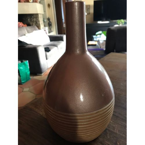 Vase soliflore en céramique beige,des cercles concentriques en bas 