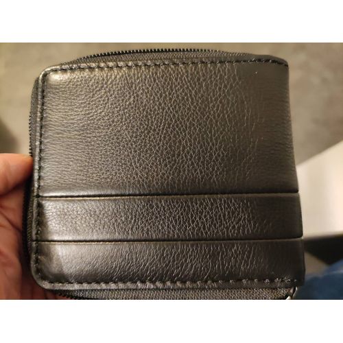 Vends portefeuille noir en cuir de marque Fossil neuf jamais utilisé 