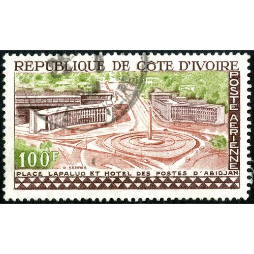 Timbre Oblitéré République De Côte D'ivoire, Poste Aérienne, Place Lapalud Et Hôtel Des Postes D'abidjan, 100 F