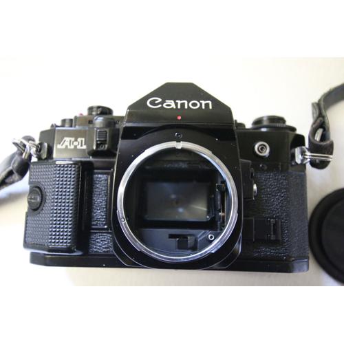 Canon A-1 + Objectif canon 35/105 + Flash speedlte 199A